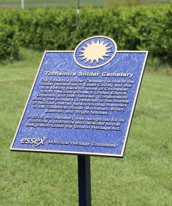 Bronze plaque staked in the ground
